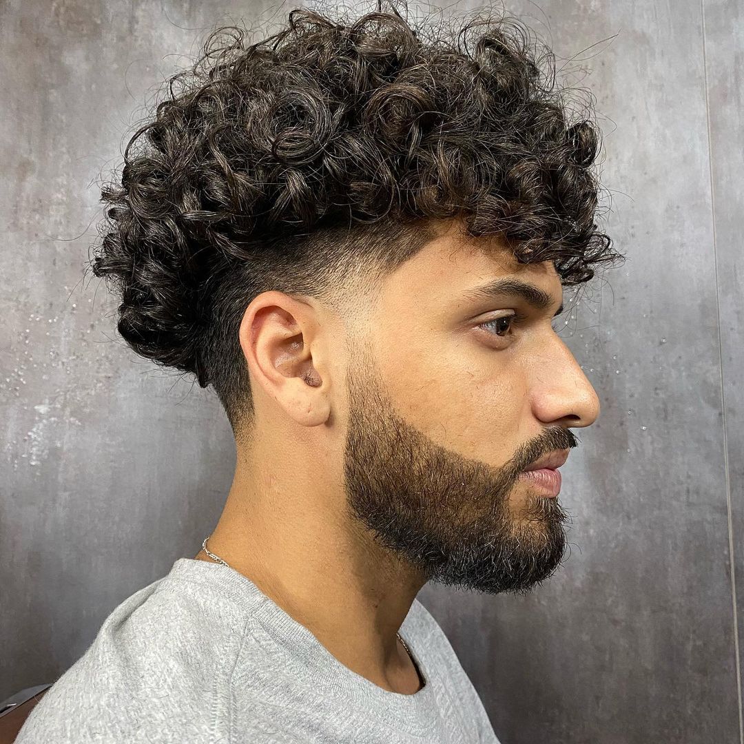 40 Ultra Cool Curly Taper Fade Haircuts for Men in 2025